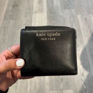 Kate Spade Black bifold wallet.